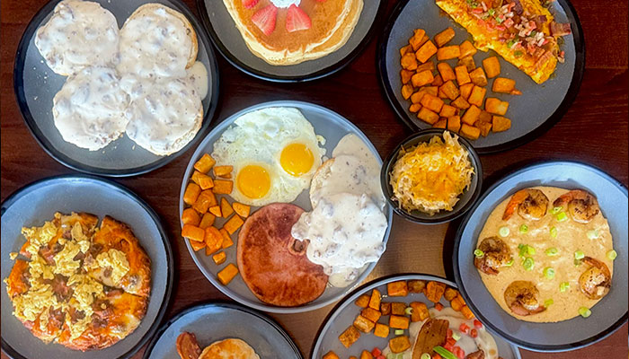 Breakfast & Brunch Menu at Cosmic Golf: eggs, pancakes, biscuits with gravy, potatoes, and grits.